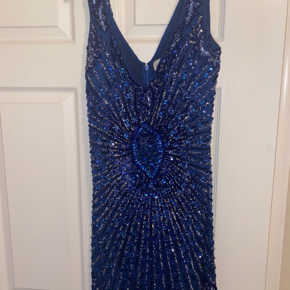 Mini formal dress. Perfect condition. Worn only once for a few hours.